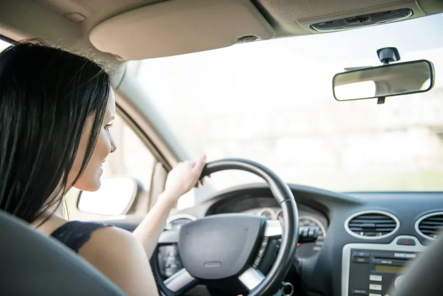 Adult driver training inside a car